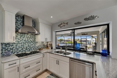 APOLLO BEACH WATERFRONT - UPDATED CUSTOM-BUILT EXECUTIVE HOME - on Apollo Beach Golf and Sea Club in Florida - for sale on GolfHomes.com, golf home, golf lot