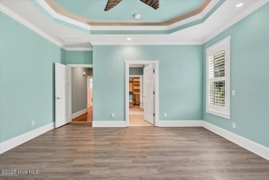 Experience the pinnacle of luxury living in this exquisite 4,200 on Members Club At St. James Plantation in North Carolina - for sale on GolfHomes.com, golf home, golf lot
