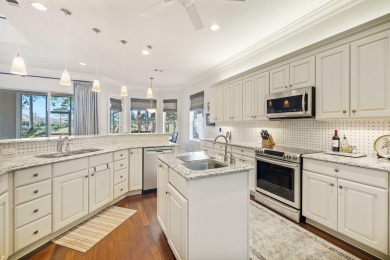 LUXURY LIVING ON THE GREEN in Regatta Bay - Stunning Views on Regatta Bay Golf and Country Club in Florida - for sale on GolfHomes.com, golf home, golf lot