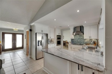 APOLLO BEACH WATERFRONT - UPDATED CUSTOM-BUILT EXECUTIVE HOME - on Apollo Beach Golf and Sea Club in Florida - for sale on GolfHomes.com, golf home, golf lot