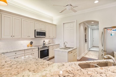 LUXURY LIVING ON THE GREEN in Regatta Bay - Stunning Views on Regatta Bay Golf and Country Club in Florida - for sale on GolfHomes.com, golf home, golf lot