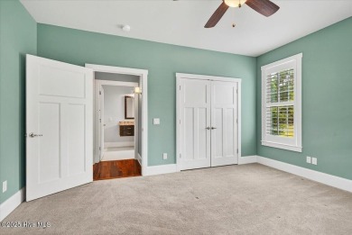 Experience the pinnacle of luxury living in this exquisite 4,200 on Members Club At St. James Plantation in North Carolina - for sale on GolfHomes.com, golf home, golf lot
