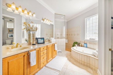 LUXURY LIVING ON THE GREEN in Regatta Bay - Stunning Views on Regatta Bay Golf and Country Club in Florida - for sale on GolfHomes.com, golf home, golf lot