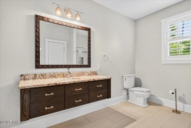 Experience the pinnacle of luxury living in this exquisite 4,200 on Members Club At St. James Plantation in North Carolina - for sale on GolfHomes.com, golf home, golf lot
