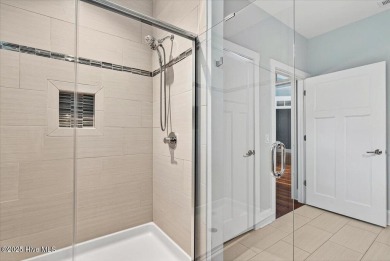 Experience the pinnacle of luxury living in this exquisite 4,200 on Members Club At St. James Plantation in North Carolina - for sale on GolfHomes.com, golf home, golf lot
