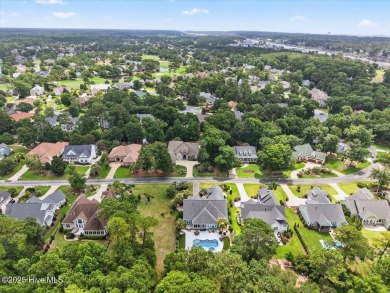 Experience the pinnacle of luxury living in this exquisite 4,200 on Members Club At St. James Plantation in North Carolina - for sale on GolfHomes.com, golf home, golf lot