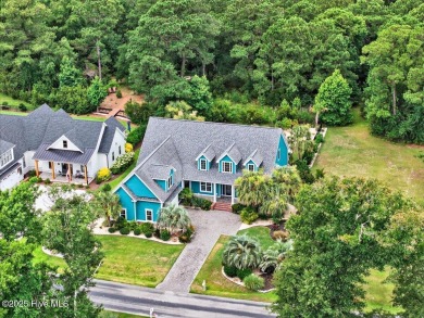 Experience the pinnacle of luxury living in this exquisite 4,200 on Members Club At St. James Plantation in North Carolina - for sale on GolfHomes.com, golf home, golf lot