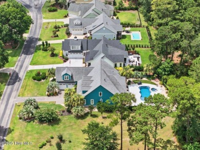 Experience the pinnacle of luxury living in this exquisite 4,200 on Members Club At St. James Plantation in North Carolina - for sale on GolfHomes.com, golf home, golf lot
