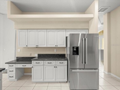 Located in Glen Lakes, this Addison built maintained home is on Glen Lakes Country Club in Florida - for sale on GolfHomes.com, golf home, golf lot