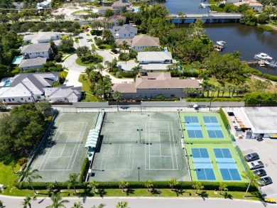 Beautifully updated, open concept 1/1.5 with 24' porcelain tile on Riverbend Golf Club in Florida - for sale on GolfHomes.com, golf home, golf lot