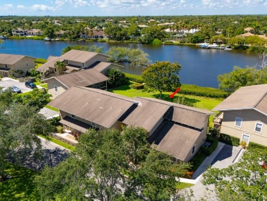 Beautifully updated, open concept 1/1.5 with 24' porcelain tile on Riverbend Golf Club in Florida - for sale on GolfHomes.com, golf home, golf lot