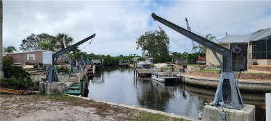 Private Boat Davits with Gulf Access in minutes is a BONUS with on Pelicans Nest Golf Club in Florida - for sale on GolfHomes.com, golf home, golf lot