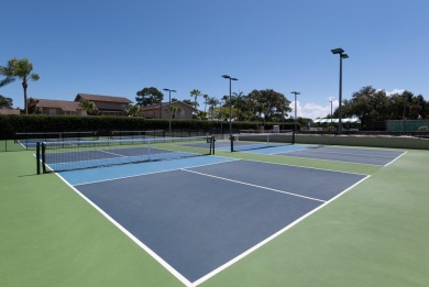 Beautifully updated, open concept 1/1.5 with 24' porcelain tile on Riverbend Golf Club in Florida - for sale on GolfHomes.com, golf home, golf lot