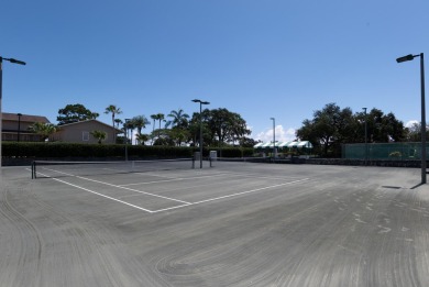 Beautifully updated, open concept 1/1.5 with 24' porcelain tile on Riverbend Golf Club in Florida - for sale on GolfHomes.com, golf home, golf lot