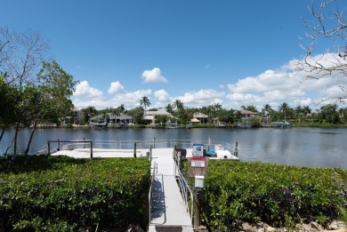 Beautifully updated, open concept 1/1.5 with 24' porcelain tile on Riverbend Golf Club in Florida - for sale on GolfHomes.com, golf home, golf lot