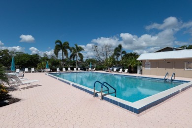 Beautifully updated, open concept 1/1.5 with 24' porcelain tile on Riverbend Golf Club in Florida - for sale on GolfHomes.com, golf home, golf lot