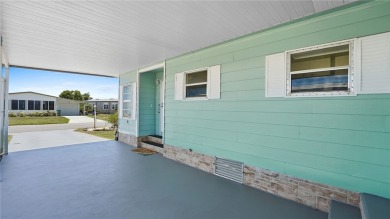Worried about shoveling snow this winter? Florida says hello on Barefoot Bay Golf Course in Florida - for sale on GolfHomes.com, golf home, golf lot