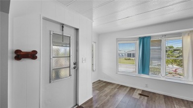 Worried about shoveling snow this winter? Florida says hello on Barefoot Bay Golf Course in Florida - for sale on GolfHomes.com, golf home, golf lot