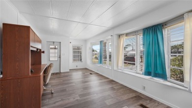Worried about shoveling snow this winter? Florida says hello on Barefoot Bay Golf Course in Florida - for sale on GolfHomes.com, golf home, golf lot