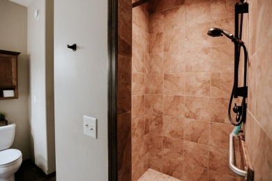 This beautifully maintained ranch home sits on over half an acre on The Ridge Golf Club in Iowa - for sale on GolfHomes.com, golf home, golf lot