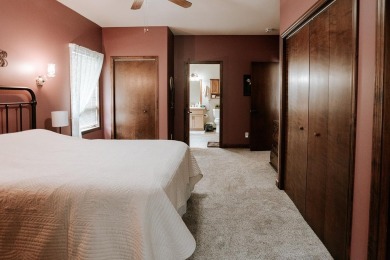 This beautifully maintained ranch home sits on over half an acre on The Ridge Golf Club in Iowa - for sale on GolfHomes.com, golf home, golf lot