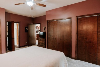 This beautifully maintained ranch home sits on over half an acre on The Ridge Golf Club in Iowa - for sale on GolfHomes.com, golf home, golf lot