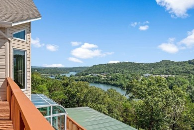 Experience breathtaking Table Rock Lake living in this on Holiday Island Golf Course in Arkansas - for sale on GolfHomes.com, golf home, golf lot