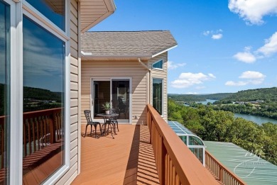 Experience breathtaking Table Rock Lake living in this on Holiday Island Golf Course in Arkansas - for sale on GolfHomes.com, golf home, golf lot