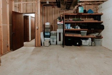 This beautifully maintained ranch home sits on over half an acre on The Ridge Golf Club in Iowa - for sale on GolfHomes.com, golf home, golf lot