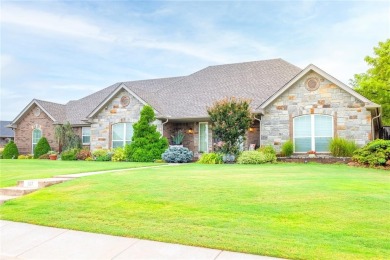 Welcome to your dream home! Nestled on an expansive corner lot on Elk City Golf and Country Club in Oklahoma - for sale on GolfHomes.com, golf home, golf lot
