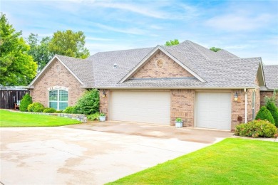 Welcome to your dream home! Nestled on an expansive corner lot on Elk City Golf and Country Club in Oklahoma - for sale on GolfHomes.com, golf home, golf lot