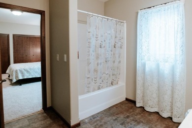 This beautifully maintained ranch home sits on over half an acre on The Ridge Golf Club in Iowa - for sale on GolfHomes.com, golf home, golf lot