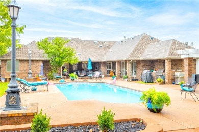 Welcome to your dream home! Nestled on an expansive corner lot on Elk City Golf and Country Club in Oklahoma - for sale on GolfHomes.com, golf home, golf lot