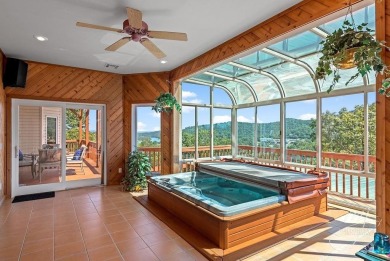 Experience breathtaking Table Rock Lake living in this on Holiday Island Golf Course in Arkansas - for sale on GolfHomes.com, golf home, golf lot