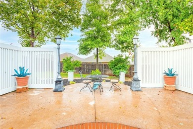 Welcome to your dream home! Nestled on an expansive corner lot on Elk City Golf and Country Club in Oklahoma - for sale on GolfHomes.com, golf home, golf lot