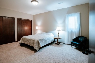 This beautifully maintained ranch home sits on over half an acre on The Ridge Golf Club in Iowa - for sale on GolfHomes.com, golf home, golf lot