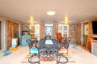 Welcome to your dream home! Nestled on an expansive corner lot on Elk City Golf and Country Club in Oklahoma - for sale on GolfHomes.com, golf home, golf lot