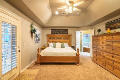 Welcome to your dream home! Nestled on an expansive corner lot on Elk City Golf and Country Club in Oklahoma - for sale on GolfHomes.com, golf home, golf lot