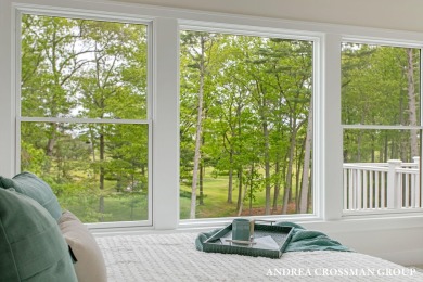 Welcome to your dream home nestled within the serene landscape on Muskegon Country Club in Michigan - for sale on GolfHomes.com, golf home, golf lot