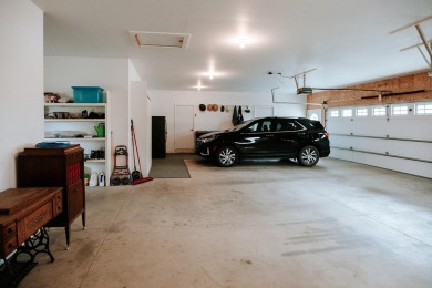 This beautifully maintained ranch home sits on over half an acre on The Ridge Golf Club in Iowa - for sale on GolfHomes.com, golf home, golf lot