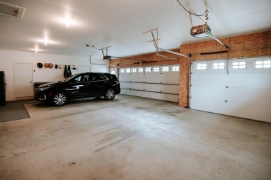 This beautifully maintained ranch home sits on over half an acre on The Ridge Golf Club in Iowa - for sale on GolfHomes.com, golf home, golf lot
