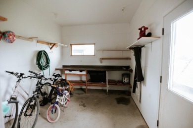 This beautifully maintained ranch home sits on over half an acre on The Ridge Golf Club in Iowa - for sale on GolfHomes.com, golf home, golf lot