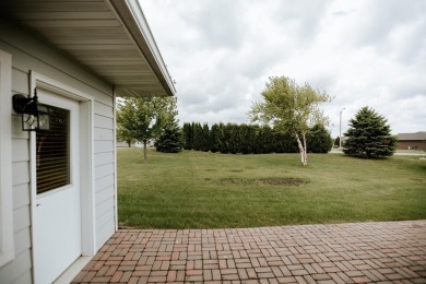 This beautifully maintained ranch home sits on over half an acre on The Ridge Golf Club in Iowa - for sale on GolfHomes.com, golf home, golf lot