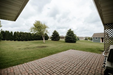This beautifully maintained ranch home sits on over half an acre on The Ridge Golf Club in Iowa - for sale on GolfHomes.com, golf home, golf lot