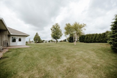 This beautifully maintained ranch home sits on over half an acre on The Ridge Golf Club in Iowa - for sale on GolfHomes.com, golf home, golf lot