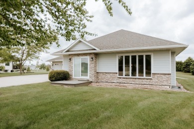 This beautifully maintained ranch home sits on over half an acre on The Ridge Golf Club in Iowa - for sale on GolfHomes.com, golf home, golf lot