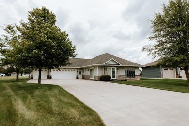 This beautifully maintained ranch home sits on over half an acre on The Ridge Golf Club in Iowa - for sale on GolfHomes.com, golf home, golf lot