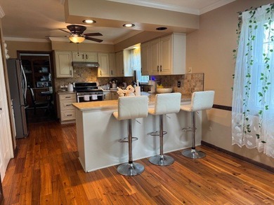 Beautiful home in Lake Shore Country Club District over looking on Lake Shore Country Club in Pennsylvania - for sale on GolfHomes.com, golf home, golf lot