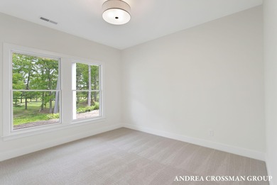 Welcome to your dream home nestled within the serene landscape on Muskegon Country Club in Michigan - for sale on GolfHomes.com, golf home, golf lot