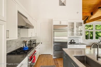 A beautifully renovated corner townhome, just a short stroll on The Snowmass Club in Colorado - for sale on GolfHomes.com, golf home, golf lot